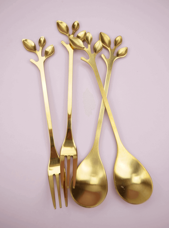 Guld skeer og gafler blad design